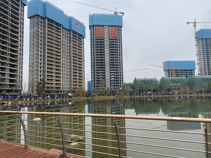 三2026世界杯官方网址乌蒙水乡项目二标段首栋主体封顶