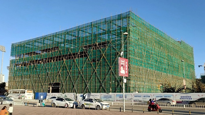​钢构世界杯官网合作平台新亚洲体育城立体停车库项目钢结构主体封顶