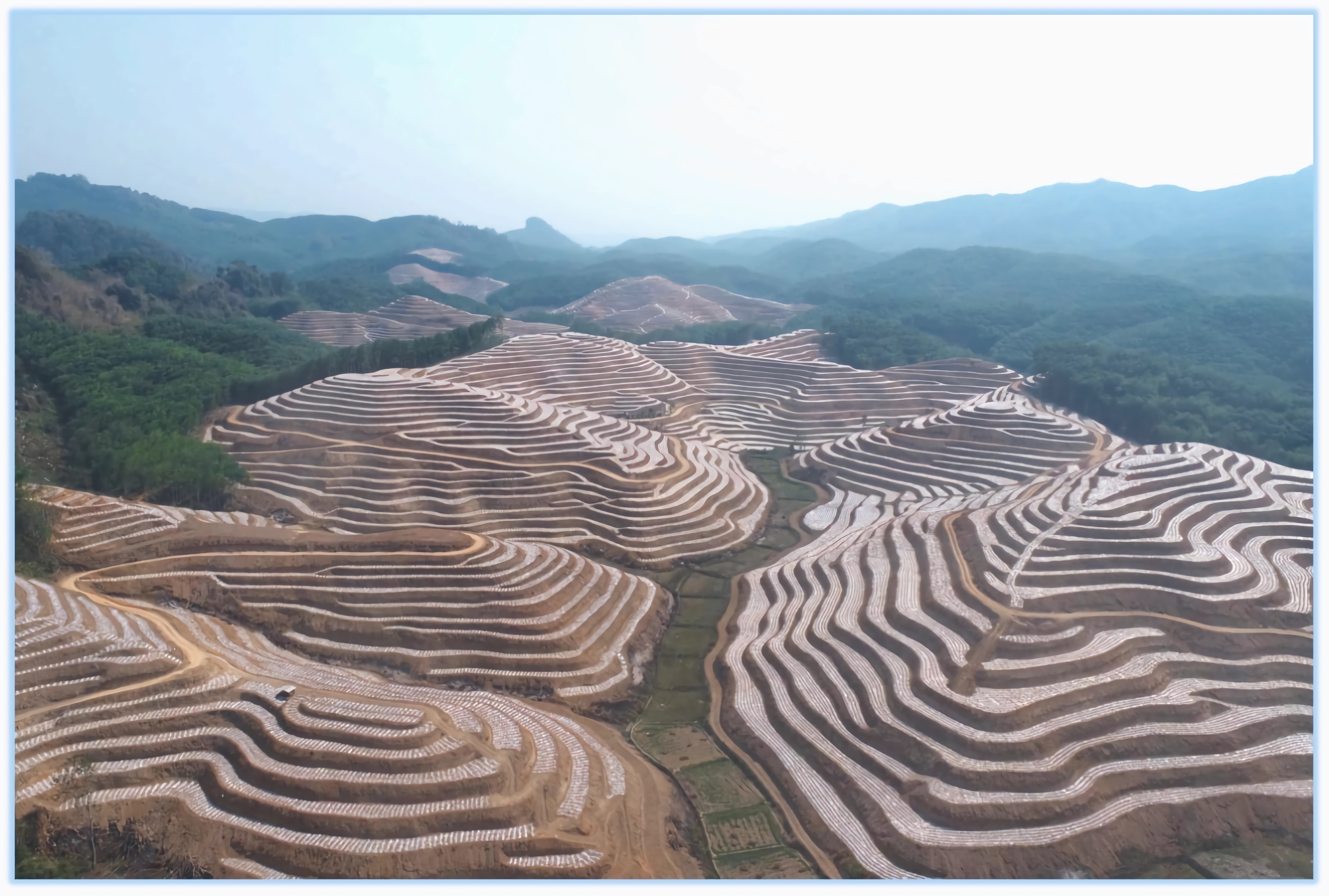 西双版纳州勐腊县关累镇勐远村曼纳龙土地整治世界杯足球平台土地平整顺利完成